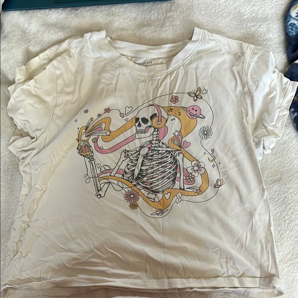White Graphic Tee with Skeleton Design